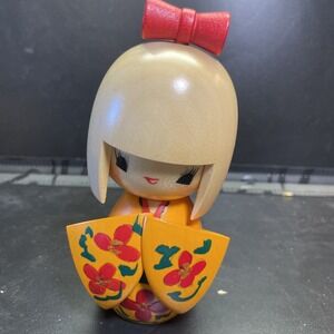 Japanese Kokeshi Blonde Red Bow Wooden Doll Girl Flower Painted 5 1/2"